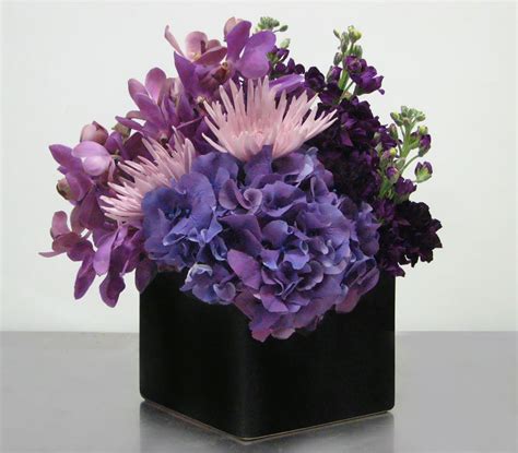 Basic 101 in floral design. Monochromatic Floral Arrangement. The varying textures ...