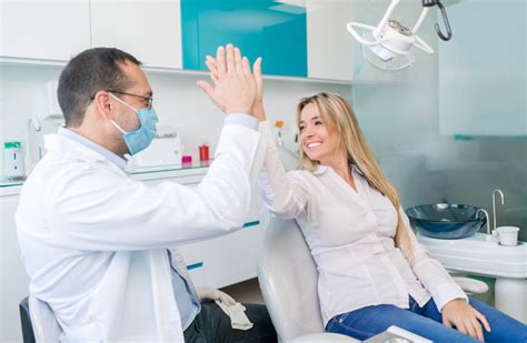 Happy patient at the dentist - Premier Family Dental - Blog