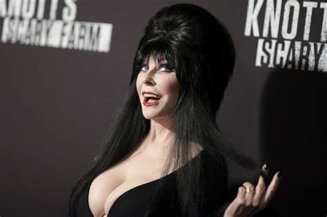 Never Before Seen Photos Of Elvira Released In Coffin Table Book