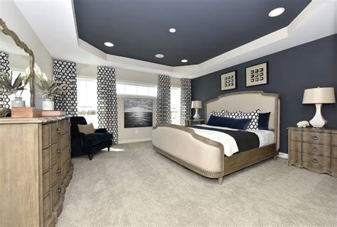 Create A Luxurious Master Bedroom By Painting A Feature Wall And The