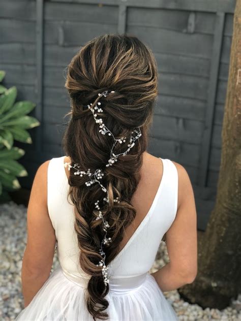 When you've got a lot of hair and want a hairstyle that is simple, yet elegant, try a top bun. Bridal Hairstyles for Long, Thick, Heavy Hair - Wedding ...