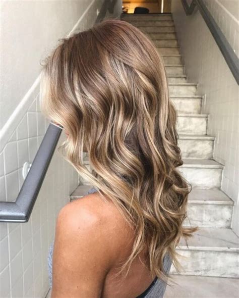 The Trendiest Spring Hair Colors For 2021 Neutral Blonde Hair Brown Hair With Blonde