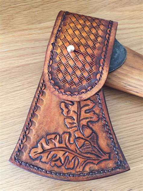 A Leather Sheath With An Intricate Design On It