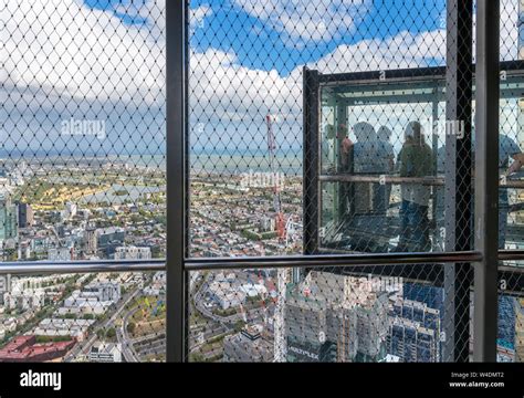 Visitors In The Edge A Glass Cube Projecting Out Over The City Eureka Skydeck Eureka Tower