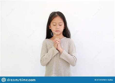 Pretty Asian Little Child Hands Praying Gesture On White Isolated