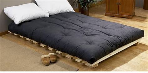 The bed is tucked underneath a trap door. Futon mattress - very affordable and overall an excellent ...