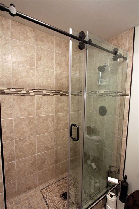 Master shower with White Rock tile and sliding glass barn doors