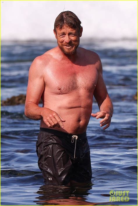 Simon Baker Goes Shirtless During Beach Day With 22 Year Old Son Claude See Photos Photo