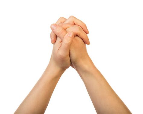 Hands Folded In Prayer Stock Photos Pictures And Royalty Free Images