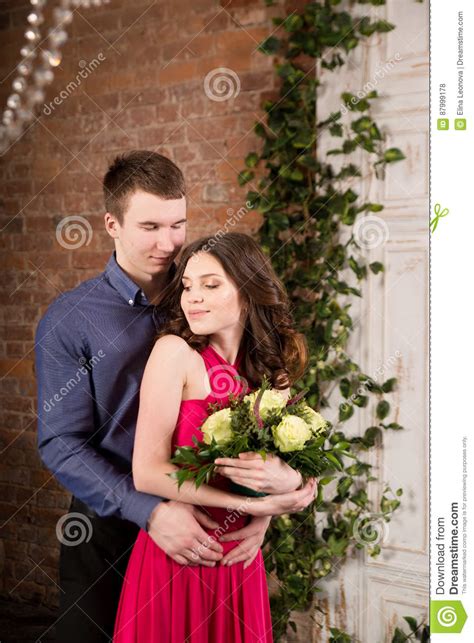 Love Story Romantic Couple With Flowers Woman In Pink Dress Stock