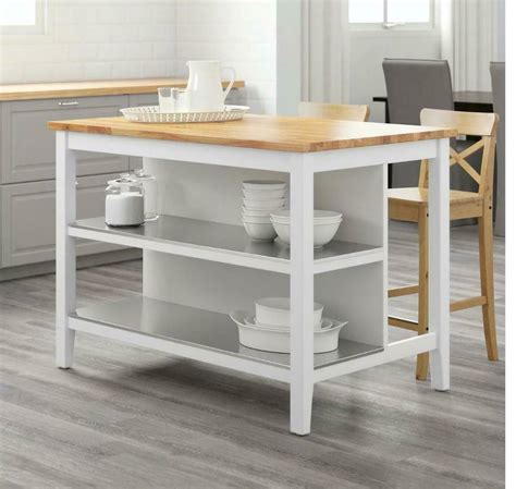 Gives you extra storage, utility and work space. Used IKEA STENSTORP Kitchen Island (White & Solid Oak) and ...