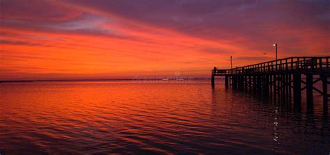 Red Sky At Sunset On Mobile Bay Alabama In October 2020 Stock Photo