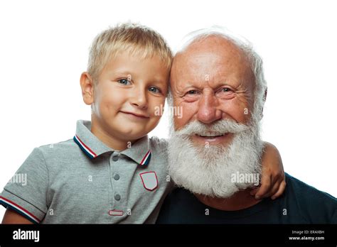 Grandfather And Grandson Smiling On White Background Stock Photo Alamy