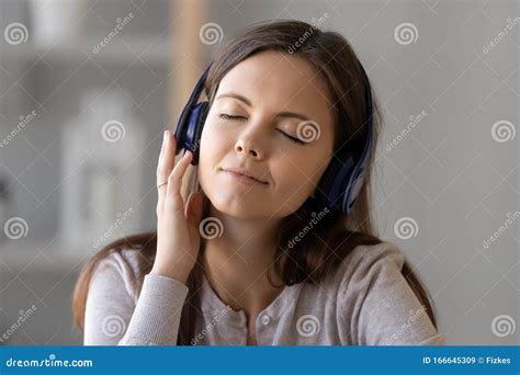 Young Woman In Earphones Relax Listening To Music Stock Image Image