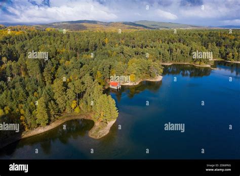 Aerial View Of Loch Vaa And Red Boathouse In Cairngorms National Park