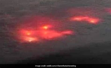 Viral Photo Pilot Spots Mysterious Red Glow In Clouds Over Atlantic