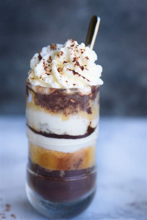 Coconut vegan milk in glass near coconut and chocolate cookies isolated on white. 4 Amazing Shot Glass Dessert Recipes | The Adventure Bite ...