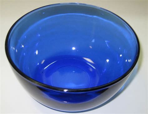 Not sure if it was intentionally made with that dip in it. ANCHOR HOCKING GLASS Cafe-Cobalt Blue Cereal Bowl 5 3/4 ...