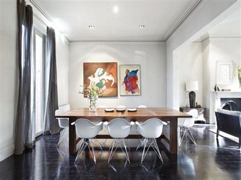 White is the base color in this room, but the muted gray brings a slightly darker tone into the bricks, walls, and floors. dark floors, white walls, grey curtains desire to inspire ...
