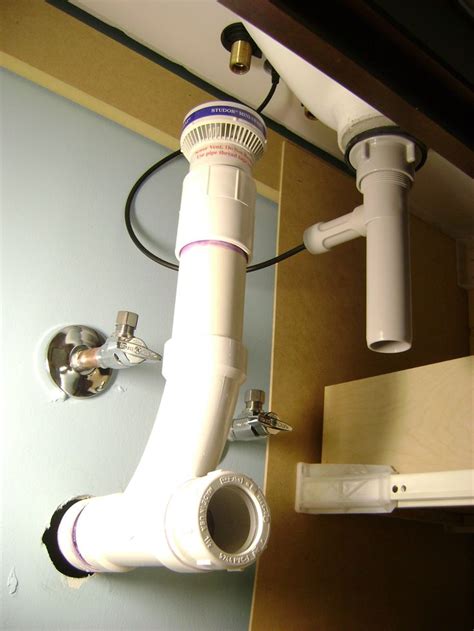 My bathroom is in the room right next to the laundry room. Image result for how to plumb drain line for washer and vent with studor vent | Bathroom sink ...