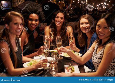 Group Of Female Friends Enjoying Meal In Restaurant Stock Photo Image Of Girls Five
