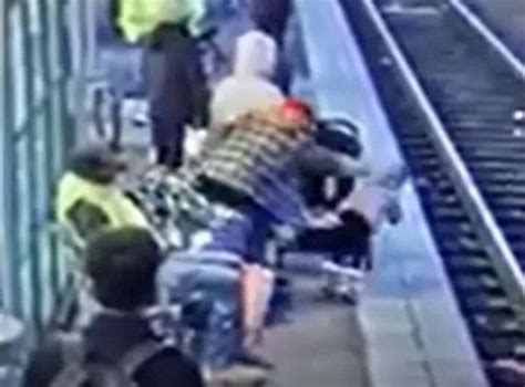 Horrifying Moment Woman Pushes Three Year Old Onto Train Tracks