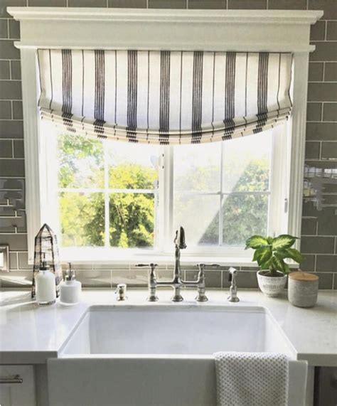 Triple awning windows blend seamlessly in this farmhouse kitchen, while providing modern energy efficiency and function. MODERN FARMHOUSe Roman Shades CUSTOM size striped roman ...