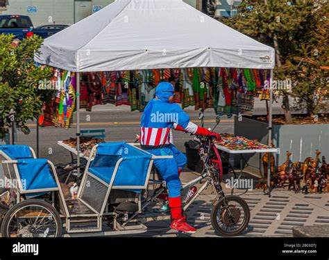 Captain America Riding Past Stock Photo Alamy