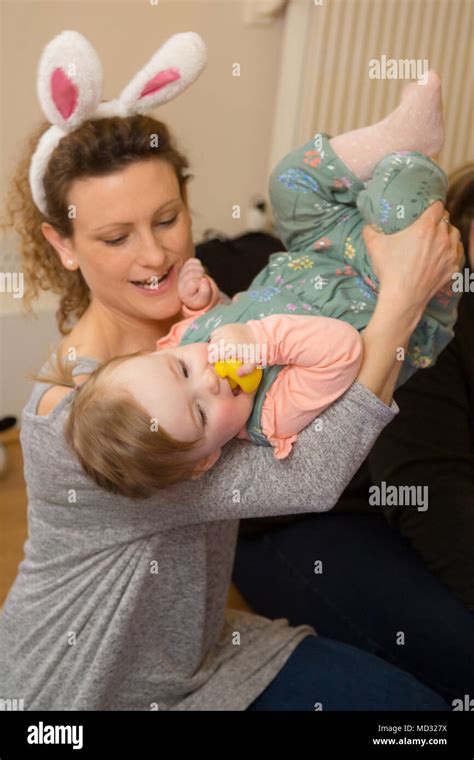 Mother Holding Her Toddler Child Stock Photo Alamy