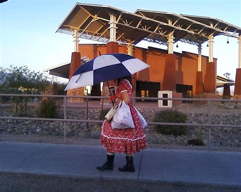Tim steller's column: 'umbrella lady' was a reluctant tucson icon in