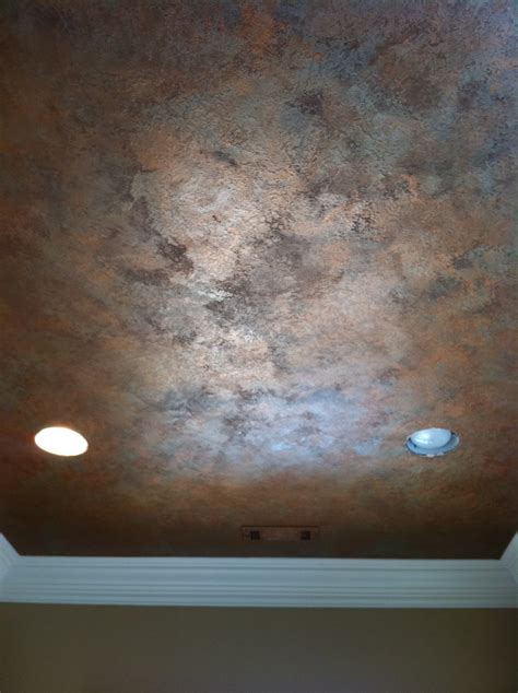 Now, many people are asking for a smooth finish on the ceiling. Knock down textured finish with metallic waxes on ceiling ...