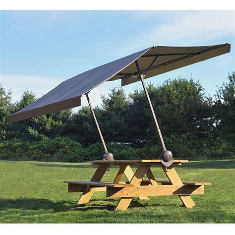 Table chair umbrella garden furniture, outdoor umbrella tables and chairs, angle, furniture, landscape png. The Clamp On Picnic Table Canopy - Hammacher Schlemmer