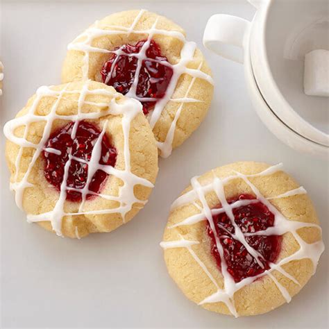 Raspberry Thumbprint Cookies With Almond Glaze Recipe Land Olakes