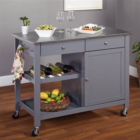 This kitchen island easily expands your work surface and storage in a tasteful ash finish. TMS Columbus Kitchen Island with Stainless Steel Top ...