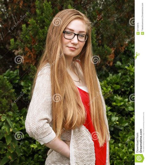 Born in caracas, venezuela to a cuban mother and venezuelan father, majandra lived between caracas and miami before permanently moving to los angeles in her late teens. Teen girl 3 stock image. Image of glasses, shirt, long ...