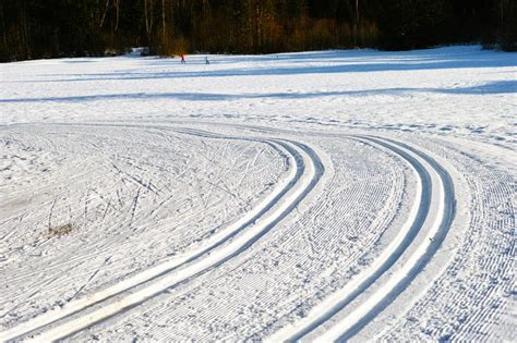 Cross Country Ski Trails In Snowy Field Winter Season Patterns Stock