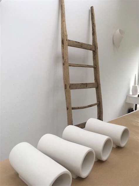 Corridor of hotel with white doors in numbers and a picture on a. Mini Serenity, Contemporary White Plaster Wall Sconce or ...