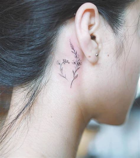 Single Needle Flowers Behind The Right Ear Single Needle Tattoo
