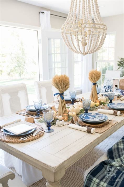 The lower edges of the utensils should be aligned with the bottom rim of the plate, about one (1) inch up from the edge of the table. Simple & Natural Table Setting Ideas | The Inspired Room
