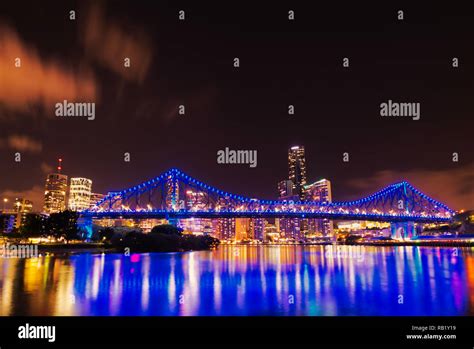 Story Bridge At Night Low Angle Cityscape Showing Light Reflections On