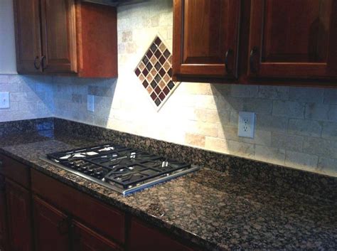 One of the most convenient aspects of a granite backsplash is that you can have one made from the same slab that was used to create your granite. what backsplash goes with baltic brown | Baltic Brown ...