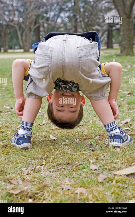 Boy Bending Over Rear Hi Res Stock Photography And Images Alamy