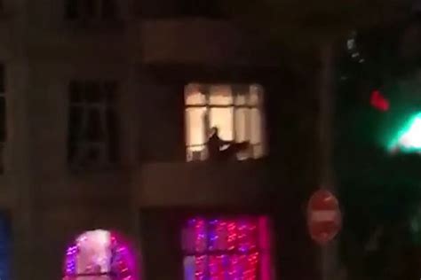 Naked Couple Put On Live Sex Show For Passersby From Their Hotel