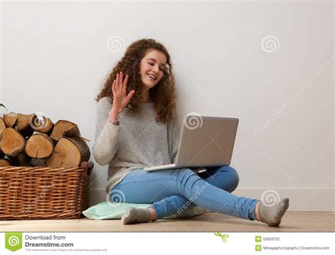 Teenage Girl Using Laptop And Waving Hello On Chat Stock Photo - Image ...
