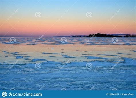 Blue Ice Of Baikal Lake Under Pink Sunset Sky Stock Image Image Of