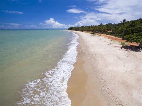 Aerial View Green Sea At A Brazilian Beach Coast On A Sunny Day In