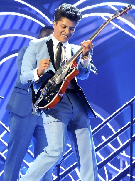 But you're really gonna break up the band on twitter?bet! Bruno Mars often sports an array of amazing suits, but ...