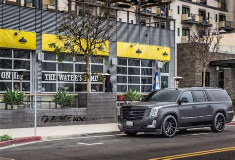 Cadillac escalade by calwing is a real standout with gold aero kit. TAG-Motorsport-Cadillac-Escalade-tuning-5 - tuningblog.eu ...
