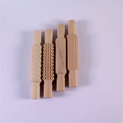 Pack Of 4 Patterned Surface Wooden Rolling Pins Economy Of Brighton