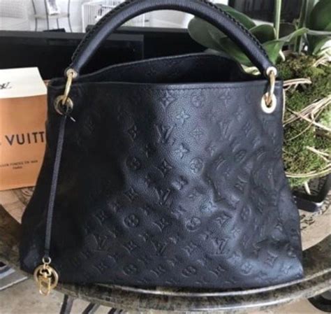 authentic louis vuitton embossed black leather handbag w gold hardware louisvuittonhand